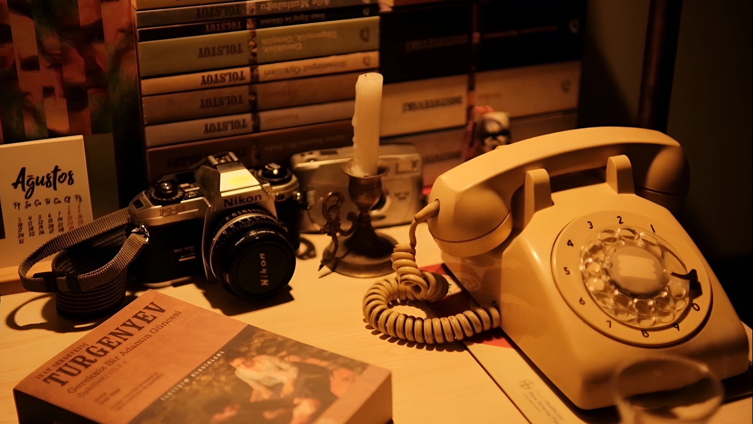 Vintage rotary telephone and tea cup